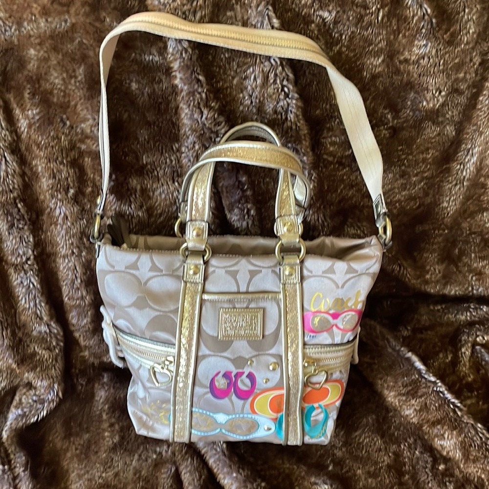 Colorful gold Coach bag with shoulder strap